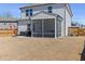 View of a fenced backyard with a screened in porch and outdoor furniture at 2040 Water Marsh Trl, Fuquay Varina, NC 27526