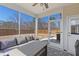 Screened porch with outdoor furniture and a view of the backyard at 2040 Water Marsh Trl, Fuquay Varina, NC 27526