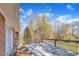 Large deck with wooden railing offering a scenic view of mature trees and beautiful surroundings at 215 Longview Dr, Smithfield, NC 27577