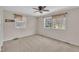 Bedroom featuring windows, carpeted floors, and neutral-colored walls at 215 Longview Dr, Smithfield, NC 27577