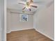 Spacious bedroom with laminate flooring, neutral paint and a ceiling fan at 215 Longview Dr, Smithfield, NC 27577