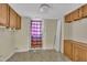 Utility room features cabinet storage and easy access to the backyard at 215 Longview Dr, Smithfield, NC 27577