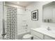 Cozy bathroom with a shower-tub combination, stylish curtain, and a modern vanity for a clean and updated look at 221 N Coral Bells Way, Four Oaks, NC 27524