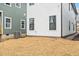 Home's backyard showcasing a newly landscaped yard next to the house's exterior siding at 2212 Edwin Ave # A, Durham, NC 27705