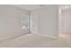 Cozy bedroom with carpet floors, a window, and a closet at 2212 Edwin Ave # A, Durham, NC 27705