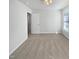 This bedroom features neutral carpeting, a ceiling fan, and a closet at 23 Round Spring Ln, Durham, NC 27712