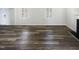 Inviting living room space with hardwood floors, bright natural light, and modern fireplace at 23 Round Spring Ln, Durham, NC 27712
