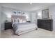 Cozy bedroom with a comfortable bed, stylish furnishings, soft lighting, and a peaceful ambiance at 231 N Coral Bells Way, Four Oaks, NC 27524