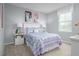 Charming bedroom with llama themed decor and lots of natural light at 231 N Coral Bells Way, Four Oaks, NC 27524