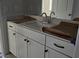 Bathroom vanity with white countertop and black hardware at 25 Bold Dr, Youngsville, NC 27596