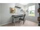 Functional home office space with a modern desk, ample lighting, and a serene view at 254 N Coral Bells Way, Four Oaks, NC 27524