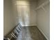 Walk-in closet offering carpeted floors and shelving for optimal storage solutions at 26 Harvest Hills Ln, Dunn, NC 28334