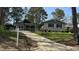 Charming home featuring a well-manicured lawn and inviting curb appeal on a sunny day at 2616 Firelight Rd, Raleigh, NC 27610