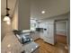 Well-lit kitchen with white cabinets, granite countertops, and stainless steel appliances for modern living at 2616 Firelight Rd, Raleigh, NC 27610