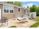 Backyard patio features a sitting area perfect for outdoor dining and relaxation at 2706 Mcneil St St, Raleigh, NC 27608