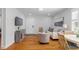 Cozy living room featuring hardwood floors, ample natural light and comfortable furniture at 2706 Mcneil St St, Raleigh, NC 27608