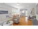 Bright living room with hardwood floors, stylish furniture and natural light from the windows at 2706 Mcneil St St, Raleigh, NC 27608
