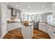 Bright kitchen with stainless steel appliances, large island, and ample counter space at 307 Augusta Pond Way # 167, Raleigh, NC 27603