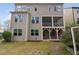 Two-story home with a screened porch overlooking the backyard at 3108 Bluff Oak Dr, Cary, NC 27519