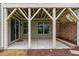 Covered patio with view of backyard and playhouse at 3108 Bluff Oak Dr, Cary, NC 27519