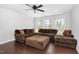 Living room with hardwood floors, recessed lighting and large sectional sofa at 3108 Bluff Oak Dr, Cary, NC 27519