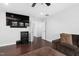 Media room features hardwood floors and large flatscreen TV at 3108 Bluff Oak Dr, Cary, NC 27519
