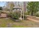 Charming playhouse nestled in a lush backyard landscape at 3108 Bluff Oak Dr, Cary, NC 27519