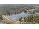 Beautiful lakefront property surrounded by lush forest and serene walking trails at 36 Deep Woods Ln, Cameron, NC 28326