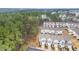 Charming townhomes nestled amongst mature trees offer a blend of nature and neighborhood comforts at 4220 Congleton Pl, Durham, NC 27703