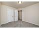 Bedroom features neutral walls, carpet, ceiling light and closet at 4220 Congleton Pl, Durham, NC 27703