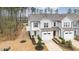 Exterior view of home with garages and simple landscaping at 4220 Congleton Pl, Durham, NC 27703