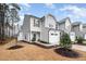 Attractive two-story home showcasing a one-car garage, neat landscaping, and a classic gray exterior at 4220 Congleton Pl, Durham, NC 27703