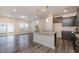 Charming kitchen with gray cabinets, granite countertops, and stainless steel appliances at 4220 Congleton Pl, Durham, NC 27703
