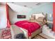 The main bedroom features a unique headboard, accent wall, and a small fireplace at 4516 Ocean Crest Cir, Raleigh, NC 27603
