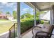 Inviting front porch with classic white columns and comfortable seating area at 4516 Ocean Crest Cir, Raleigh, NC 27603