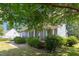 Covered front porch with decorative iron railings, offering a peaceful outdoor space at 4516 Ocean Crest Cir, Raleigh, NC 27603