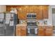 Close up of a kitchen with stainless steel appliances and granite countertops at 4516 Ocean Crest Cir, Raleigh, NC 27603