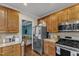 Kitchen with stainless steel appliances and granite countertops at 4516 Ocean Crest Cir, Raleigh, NC 27603
