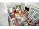Aerial view of an open living room featuring a fireplace, high ceilings, and natural light at 4516 Ocean Crest Cir, Raleigh, NC 27603