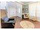 Inviting living room featuring hardwood floors, staircase, and stylish decor at 4516 Ocean Crest Cir, Raleigh, NC 27603