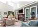 Cozy living room showcasing a fireplace, custom built-ins, and stylish decor at 4516 Ocean Crest Cir, Raleigh, NC 27603