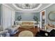 Comfortable living area with unique lighting fixture and stylish decor at 4516 Ocean Crest Cir, Raleigh, NC 27603