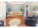 Comfortable living room featuring hardwood floors and open access to the kitchen at 4516 Ocean Crest Cir, Raleigh, NC 27603