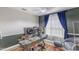 Office space with natural light, neutral paint, and room for desk and seating at 4516 Ocean Crest Cir, Raleigh, NC 27603