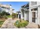 Exterior of building, showcasing landscaping and unique architectural details at 4911 Hollenden Dr # 208, Raleigh, NC 27616