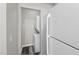 Hall laundry includes stacked washer/dryer unit conveniently located near the kitchen at 4911 Hollenden Dr # 208, Raleigh, NC 27616