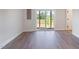 Unfinished basement with slider door leading to a backyard view at 509 Sherron Rd # 36, Raleigh, NC 27703