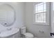 Powder room with pedestal sink, and natural light at 509 Sherron Rd # 36, Raleigh, NC 27703