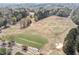Panoramic aerial shot of a sprawling golf course and green landscapes at 5125 Salinas Ct, Holly Springs, NC 27540