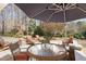 This relaxing backyard setting provides ample seating and a dining area to sit and unwind at 5125 Salinas Ct, Holly Springs, NC 27540